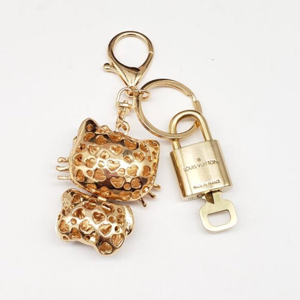 Louis Vuitton Gold Lock 🔒 Authentic LV Key + Unbranded Hello Kitty Bag Charm - Picture 6 of 7